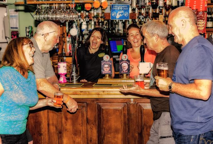 Drinkers at a Merseyside pub toast their choice for the next leader of the Labour Party